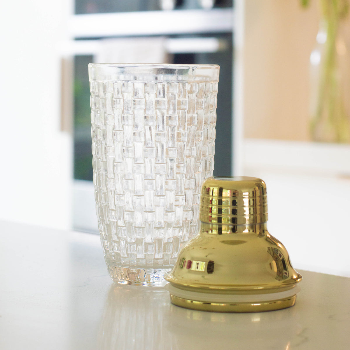 Glass shaker with gold lid